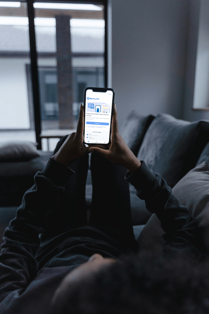 A man is using HeHealth app